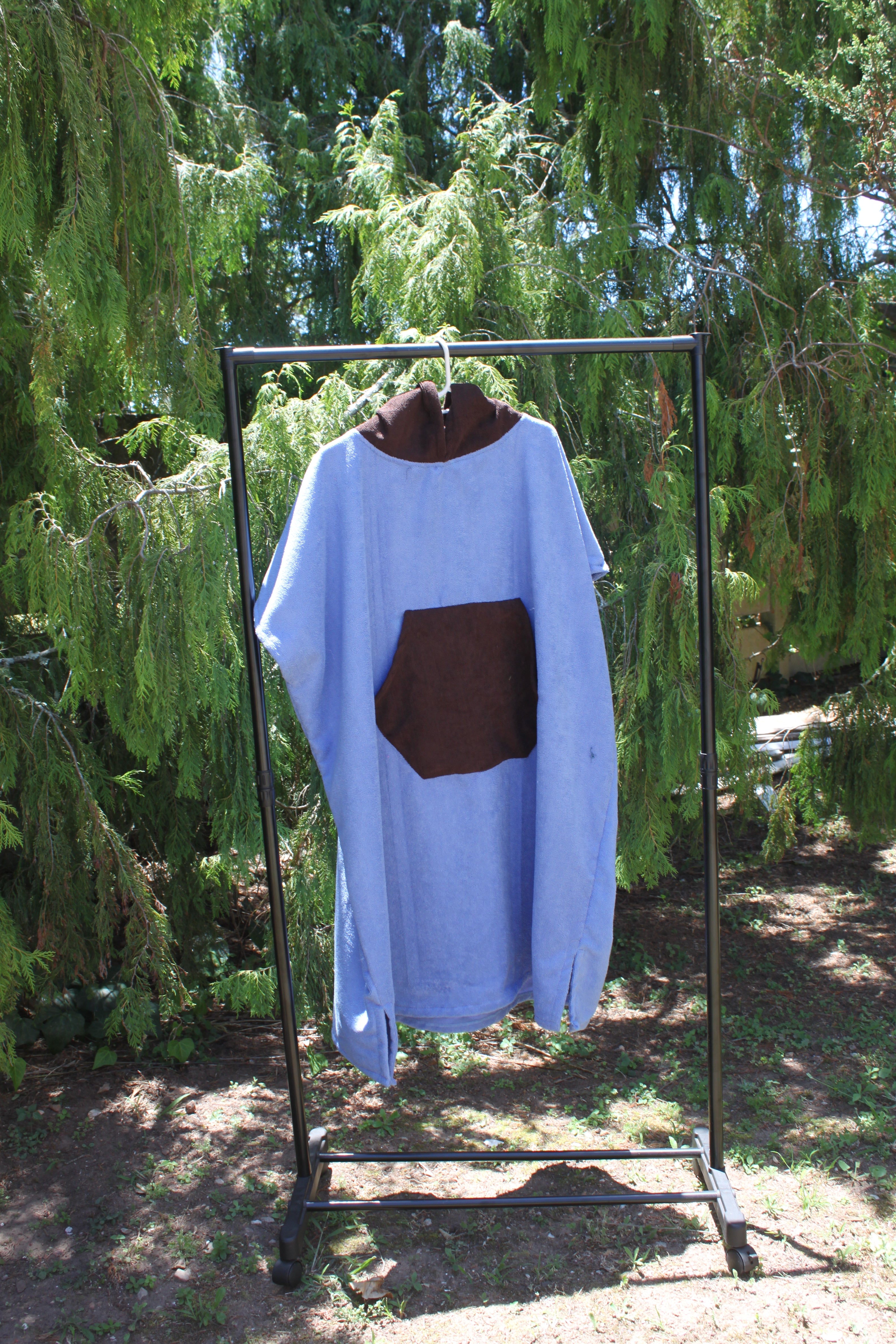 Adult Towel Poncho: Light blue with brown pocket